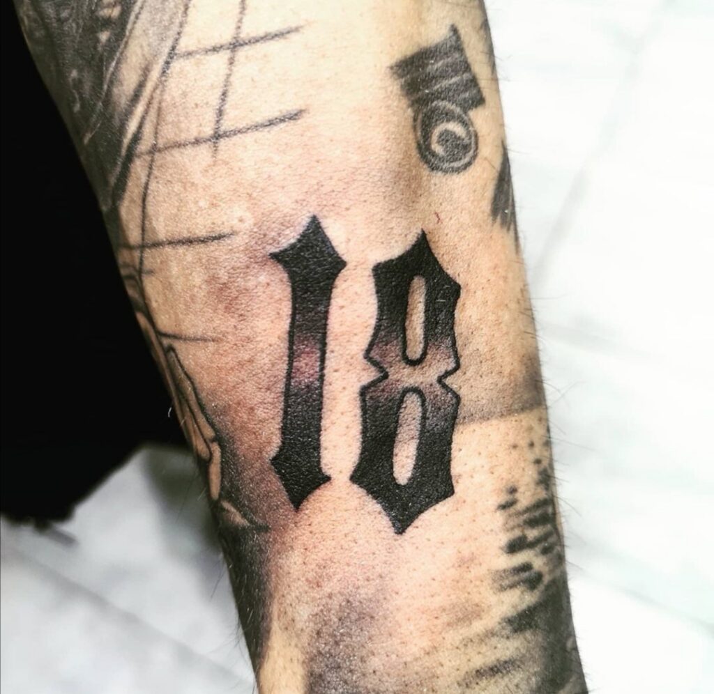 Number 18 tattoo