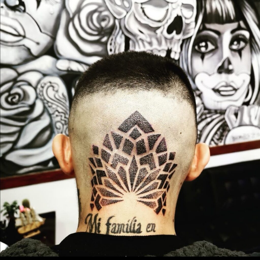 Mandala dot tattoo on neck